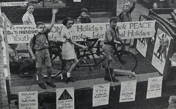 The YHA’s north-east Lancashire regional group using a repurposed lorry for a peace demonstration in 1938. One of the five posters attached to the lorry carries an advert for the ‘1,800 youth hostels’ in Germany. 